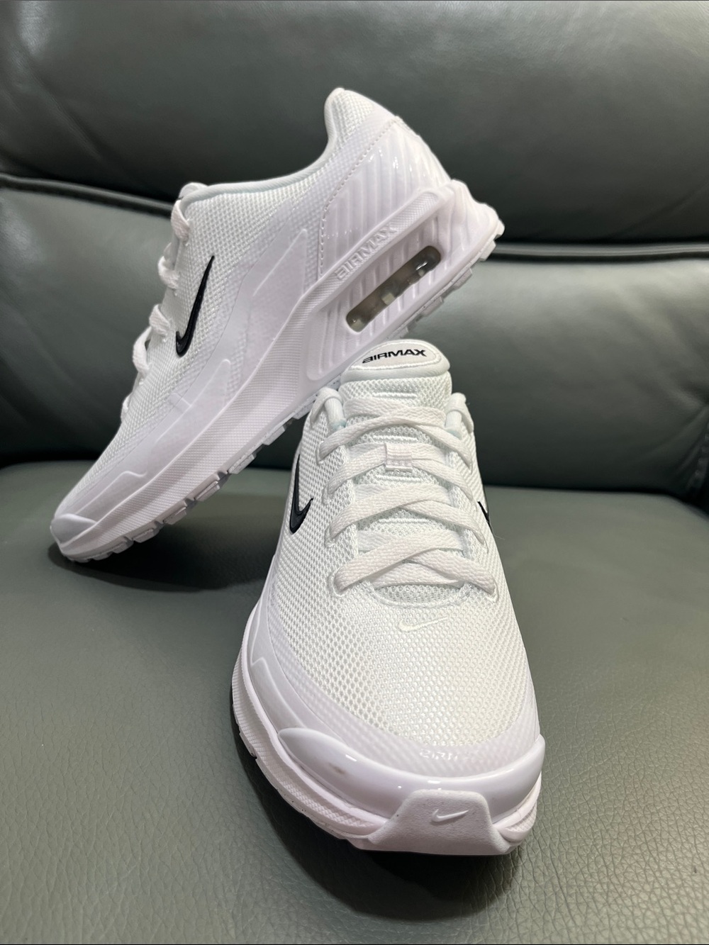 Nike Air Max woman’s White Sneakers with Black Swoosh Accent